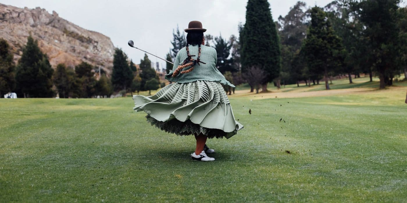 Cover image for the article: Tradition Meets Fairway: The Cholitas Golfers of Bolivia Redefining the Gam